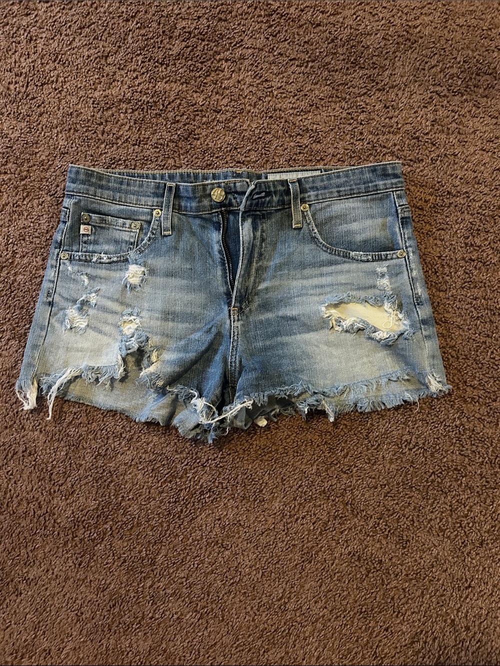 AG Adriano Goldschmied Distressed Light Blue Denim Cutoff Shorts